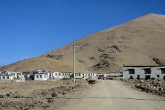 03 Passing Through A Tibetan Village On the Tingri Plain Driving From Tingri To Mount Everest North Base Camp In Tibet
